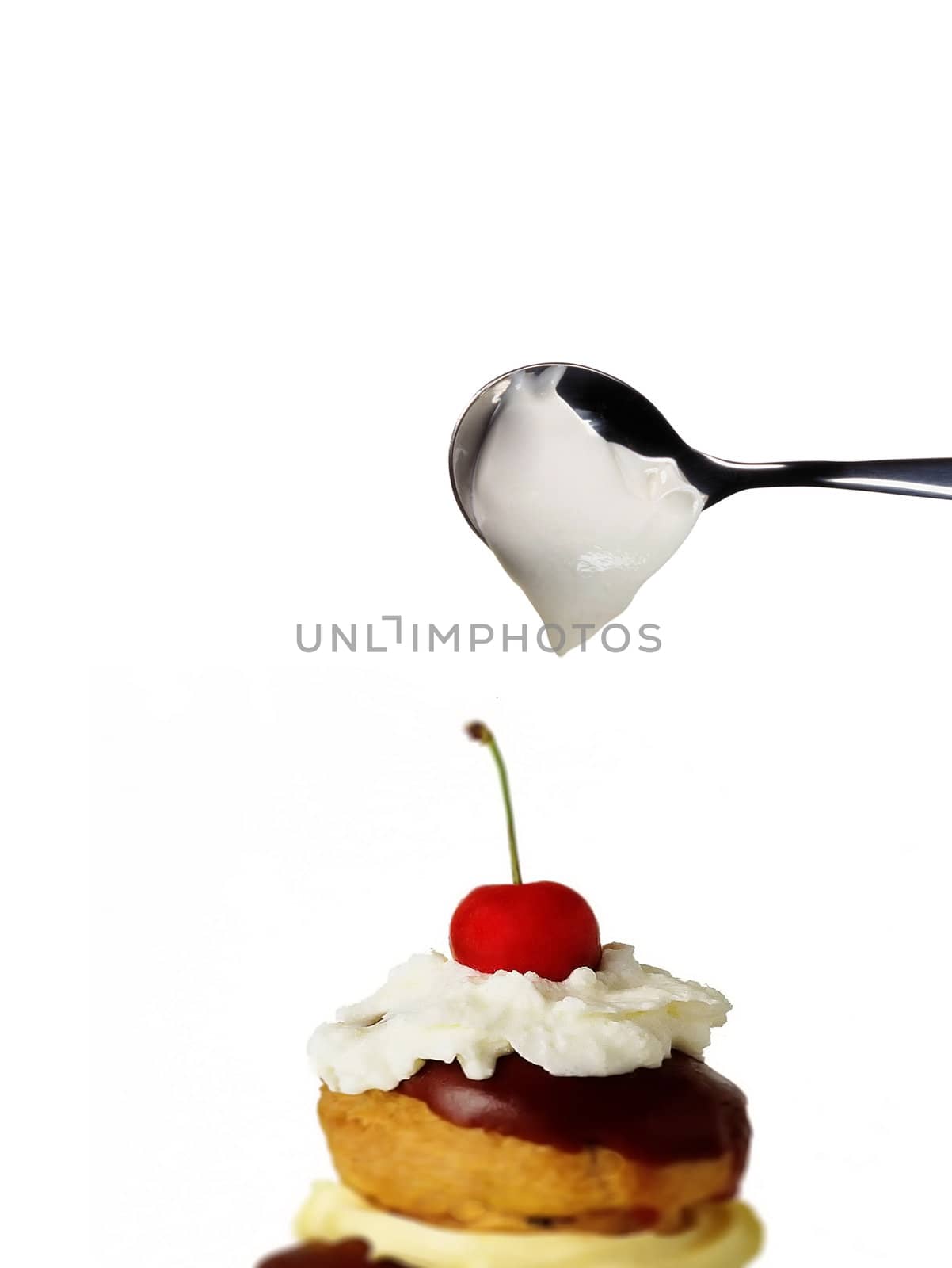 cake cherry with spoon cream
