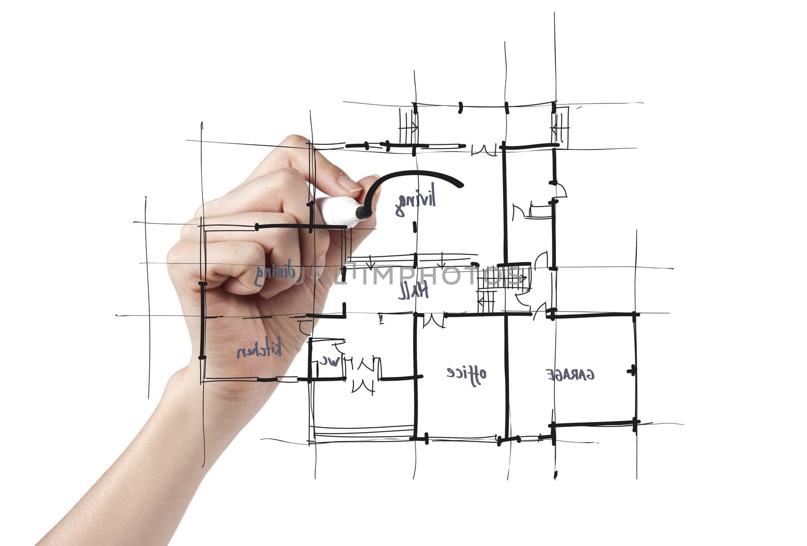 An architect puts the shetch design touches on the blueprint for a new house.