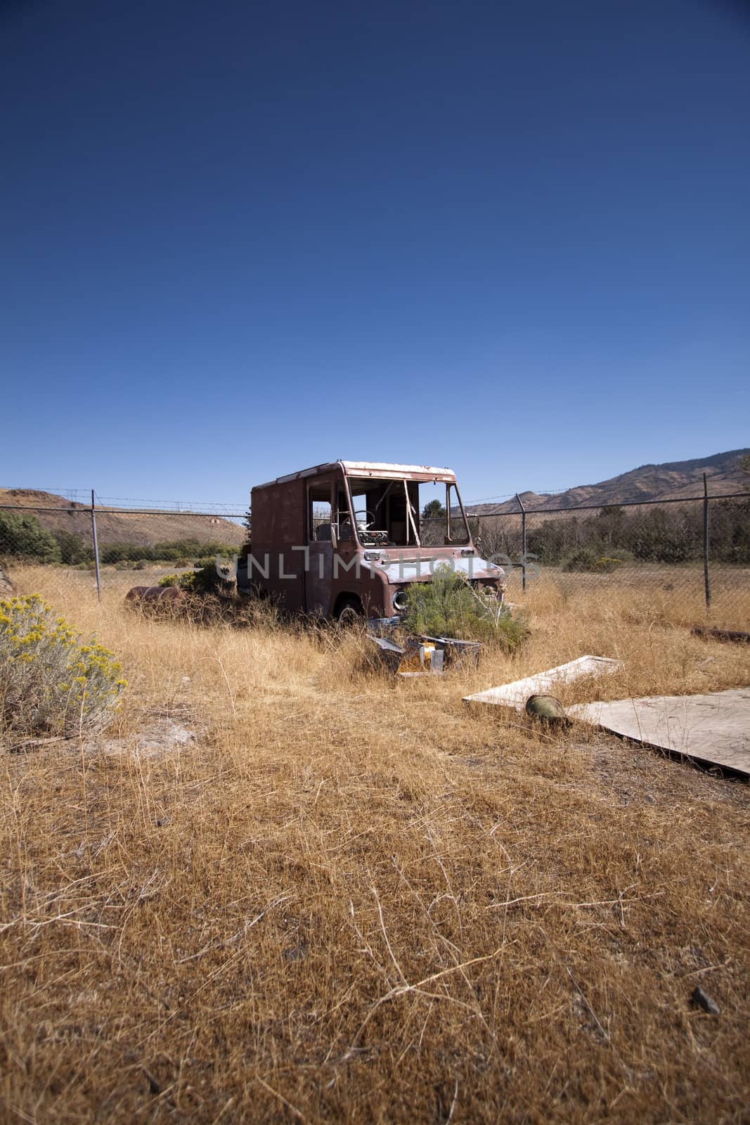 An old rusty abandoned car.