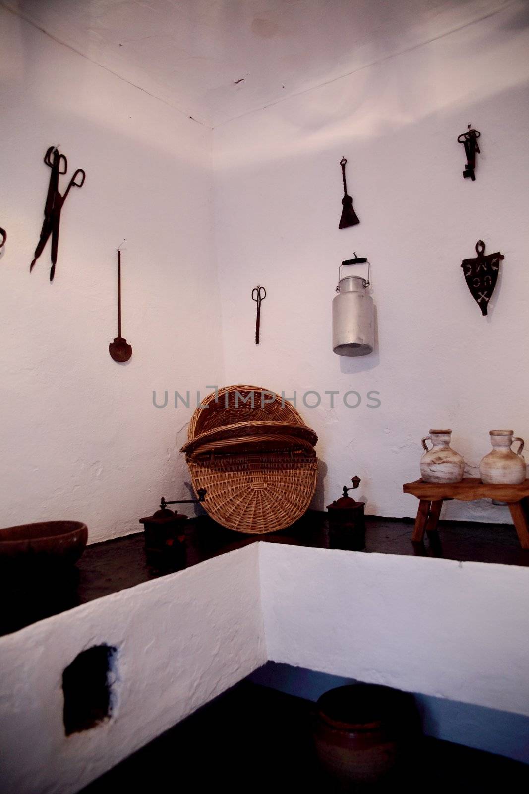 Picture of an aged kitchen with some utensils