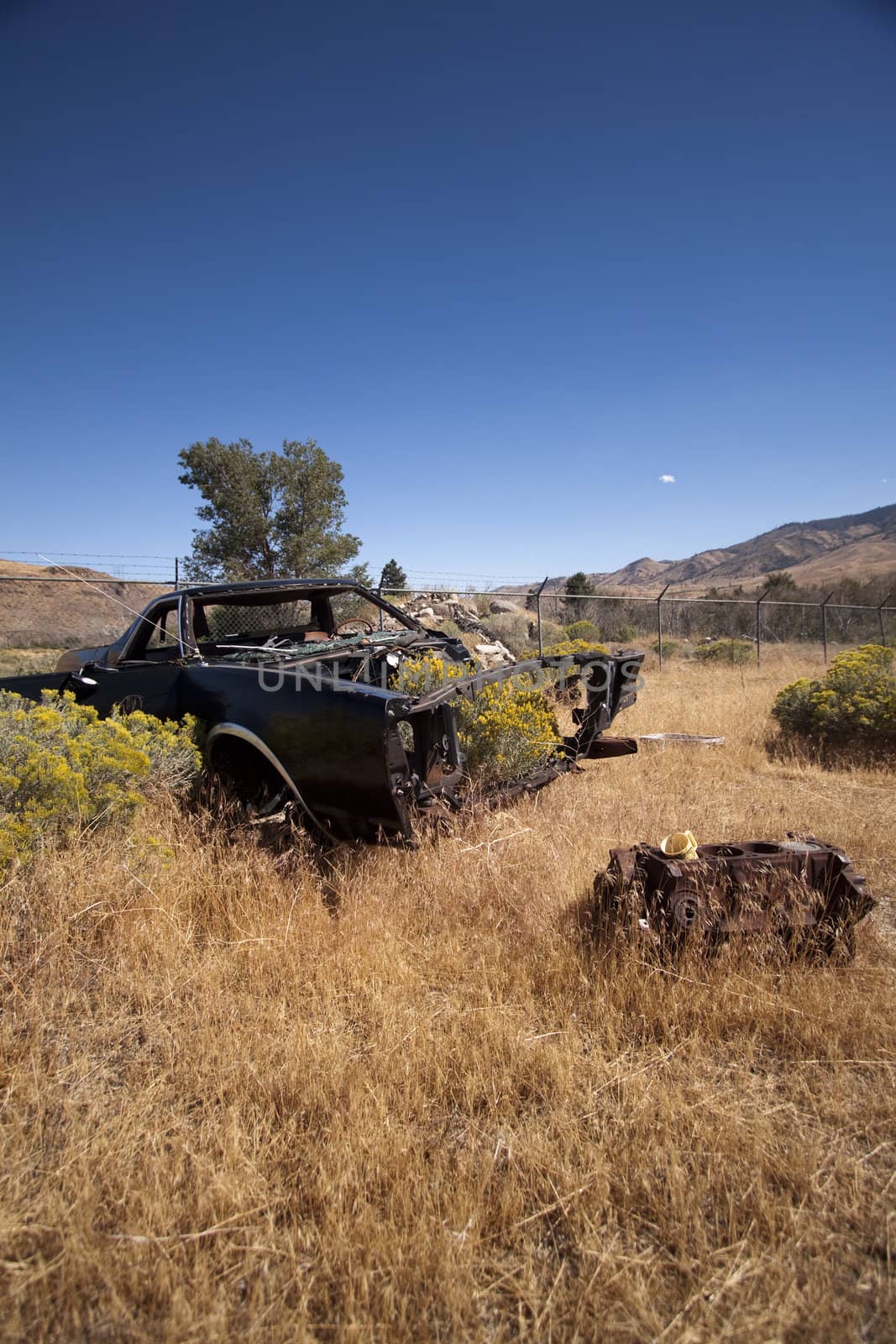 An old rusty abandoned car.