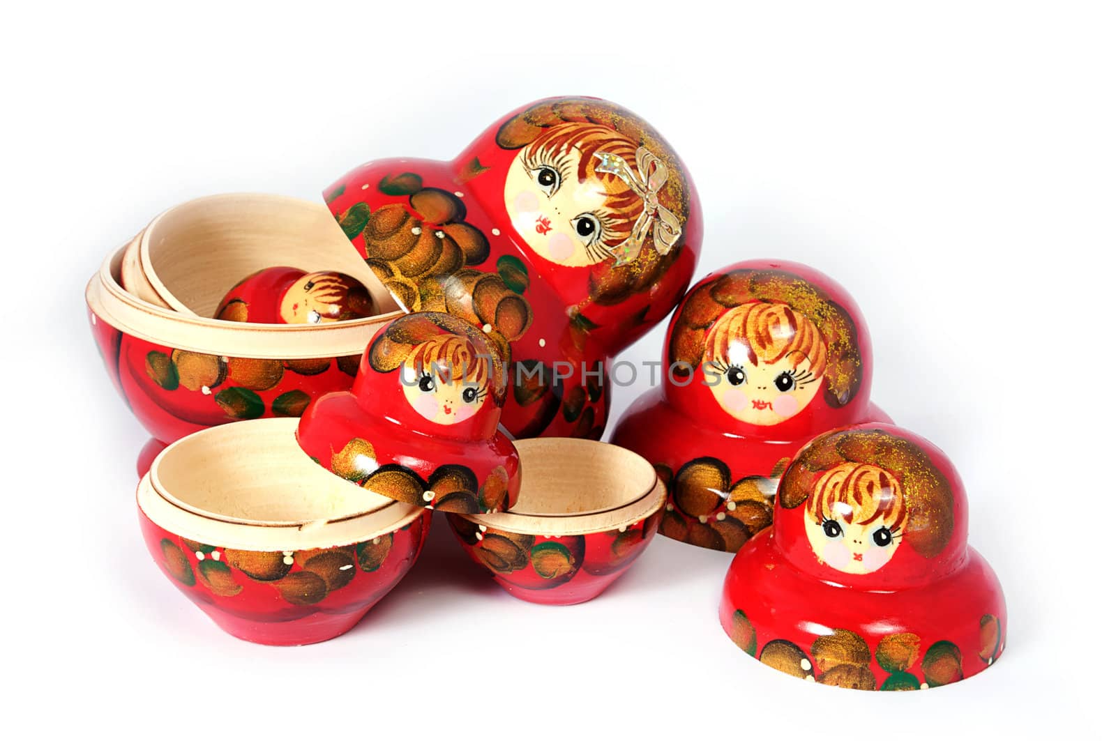 Opened Russian doll on white background.