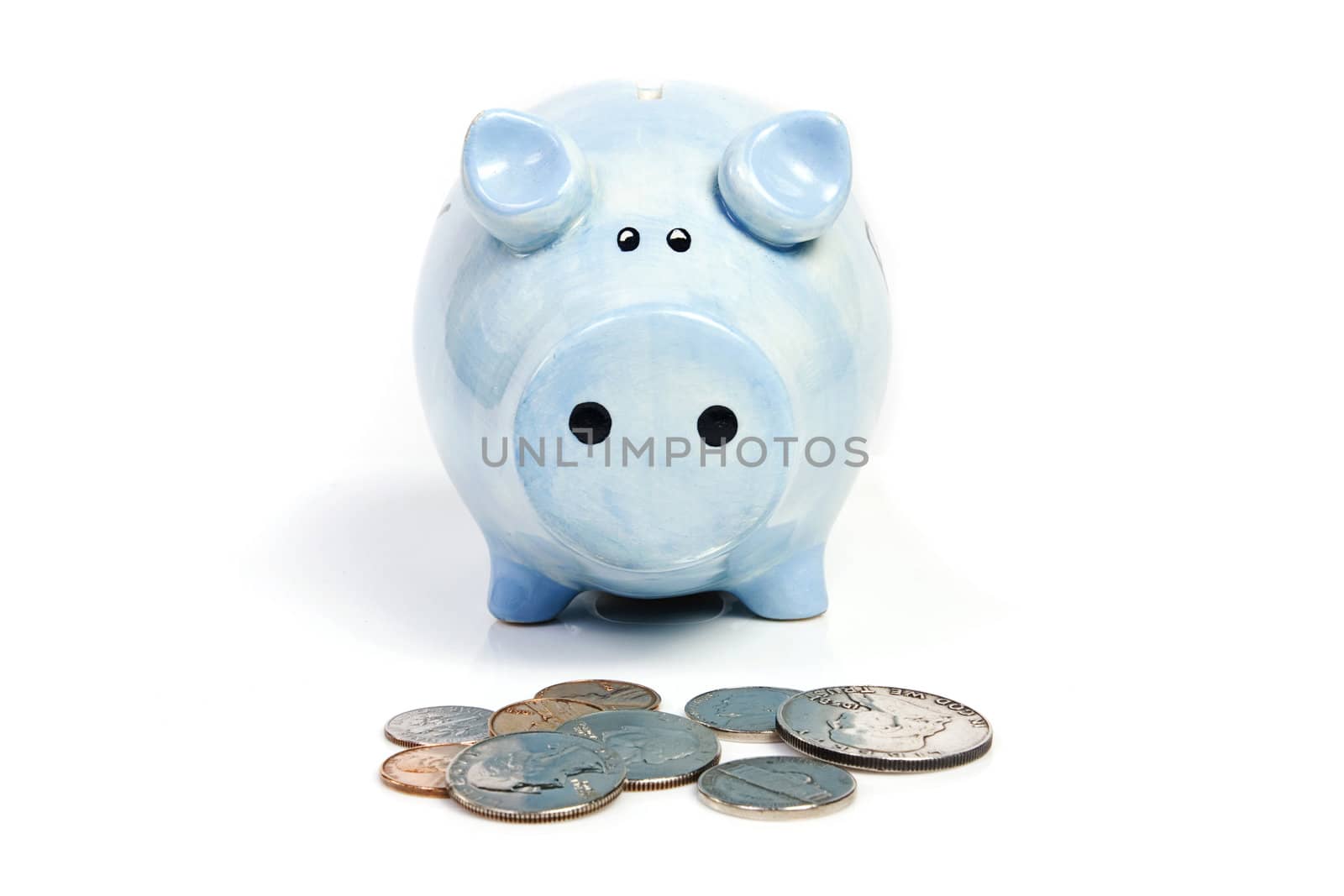 Blue piggy bank savings and coins on white isolated