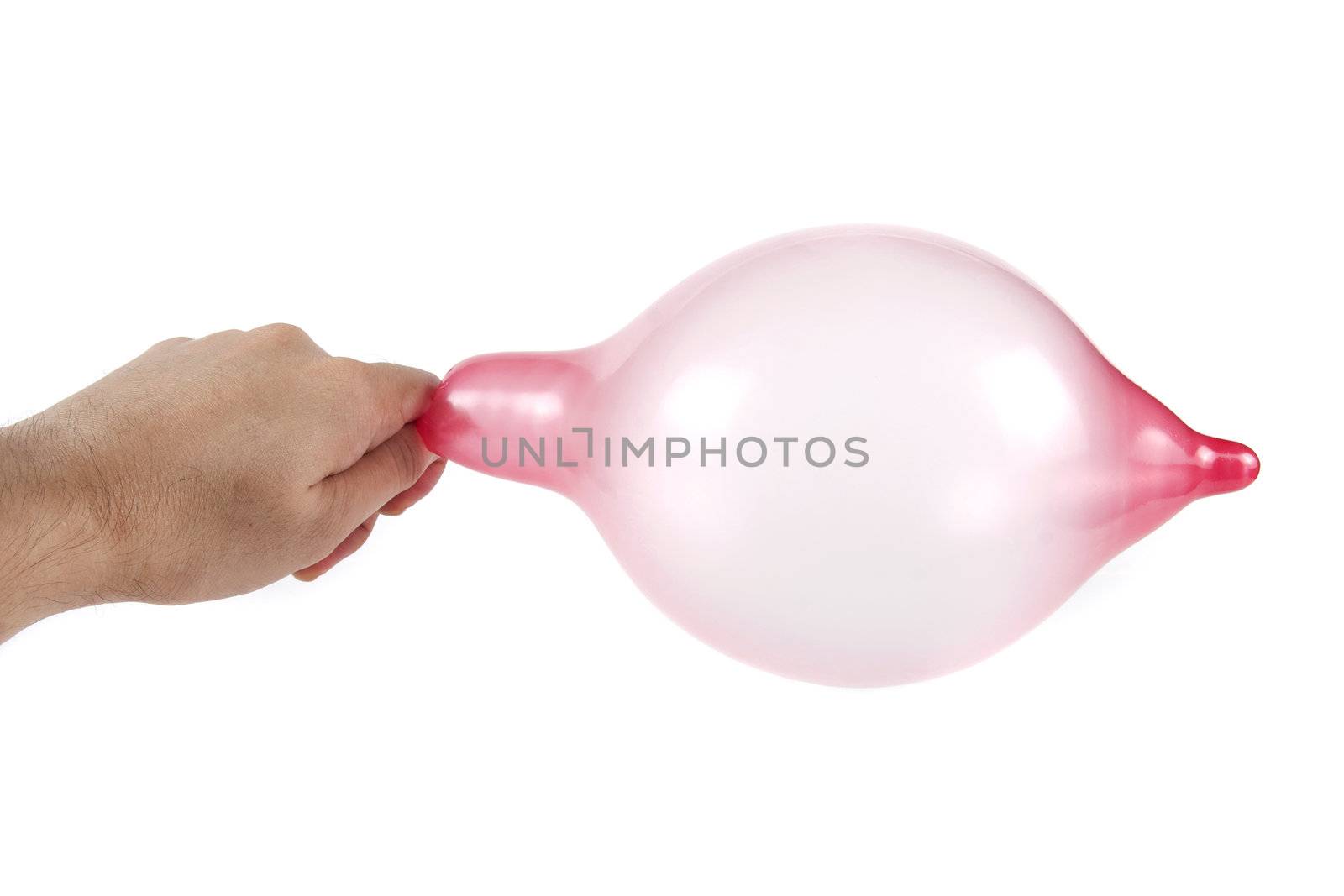 Inflates condom in hand on the white background