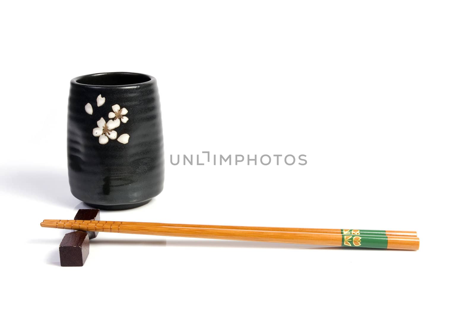 Chopsticks and tea bowl-japanese kitchen utensil on white background