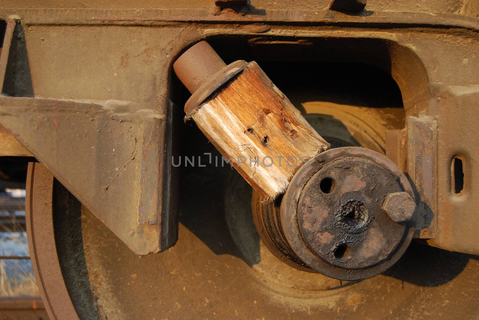 Wedged railway wheel of abandoned wagon close-up