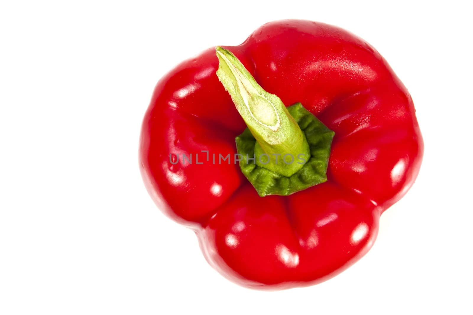 Top view of red bell pepper on white background