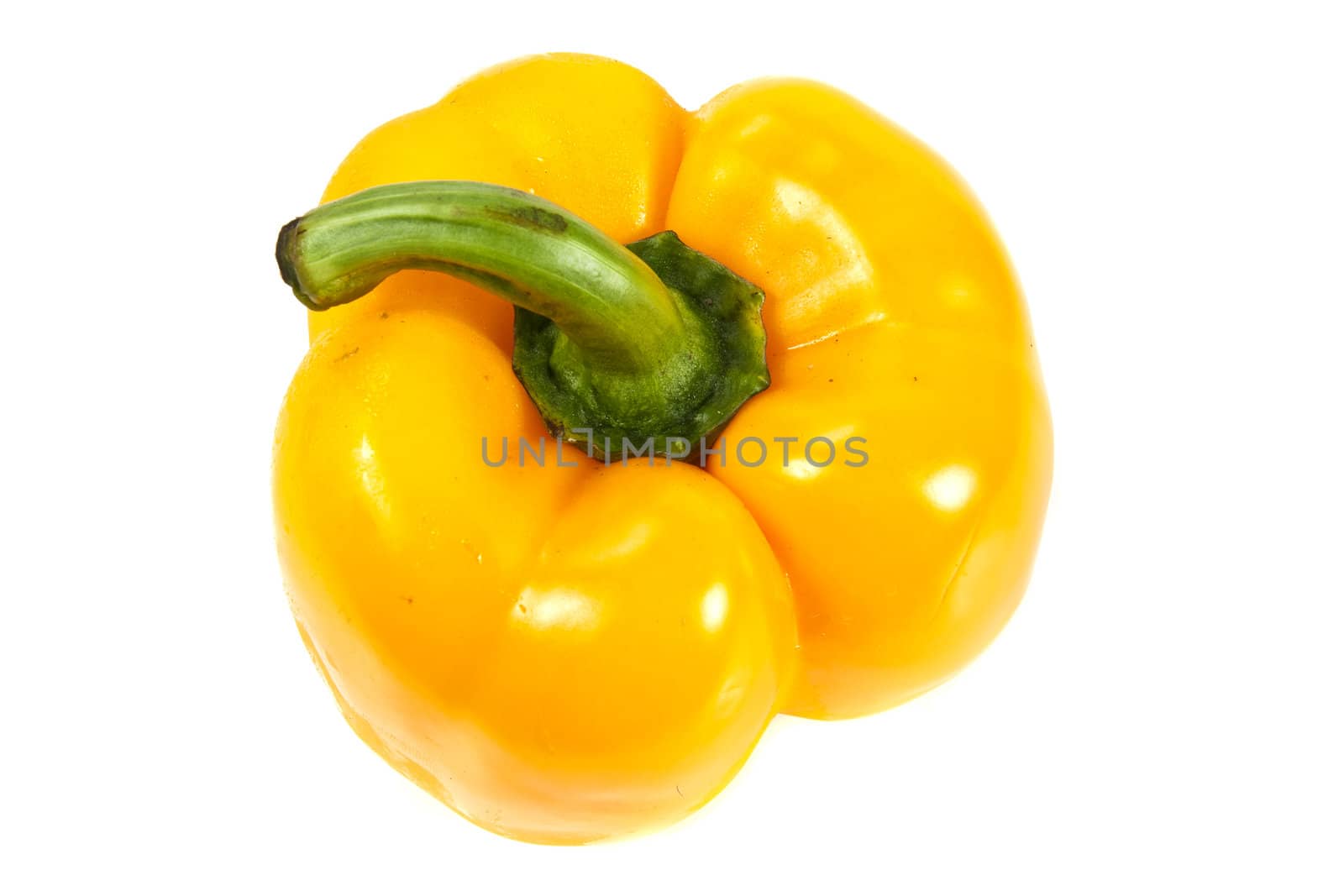 Top view of yellow bell pepper on white background