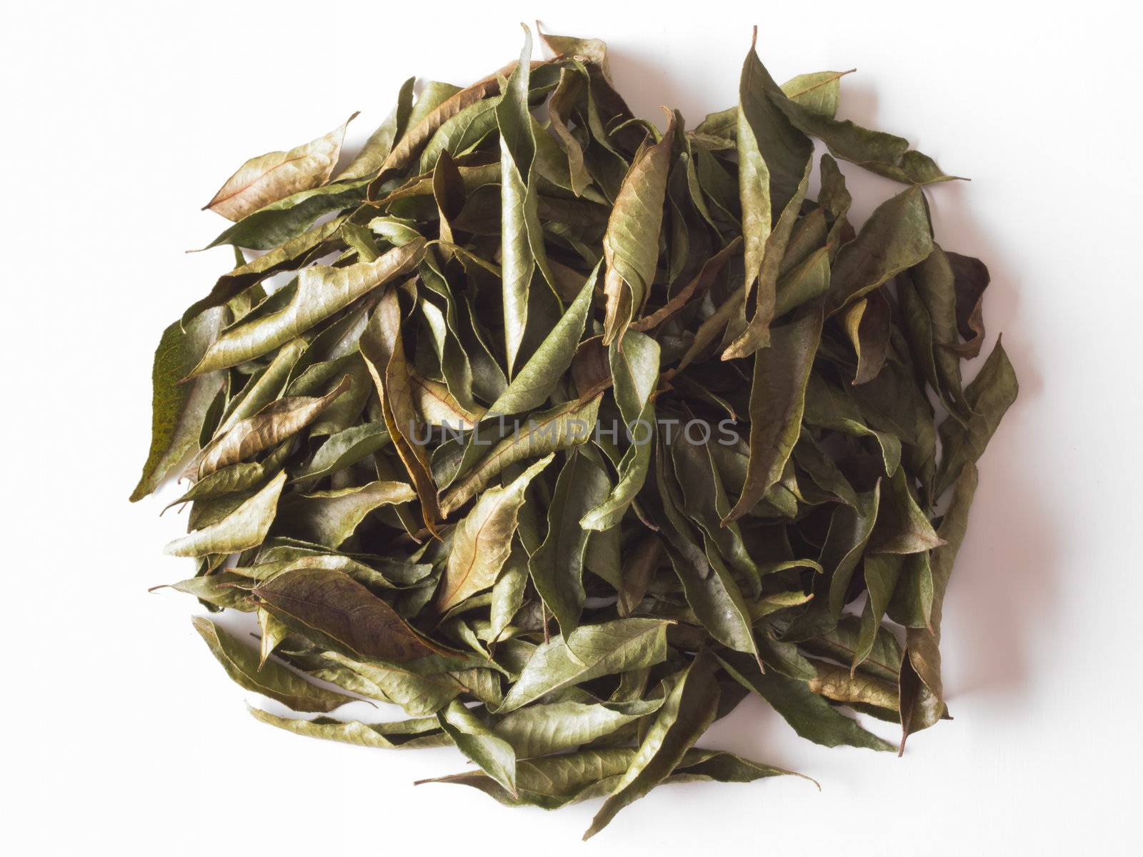 close up of a heap of indian dried curry leaves