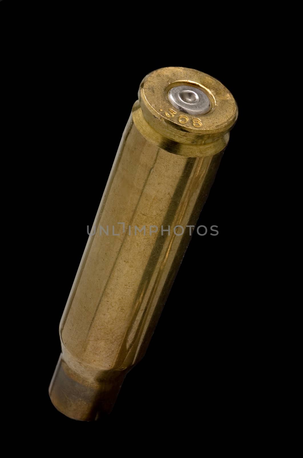 Dirty Used .308 shell casing on black