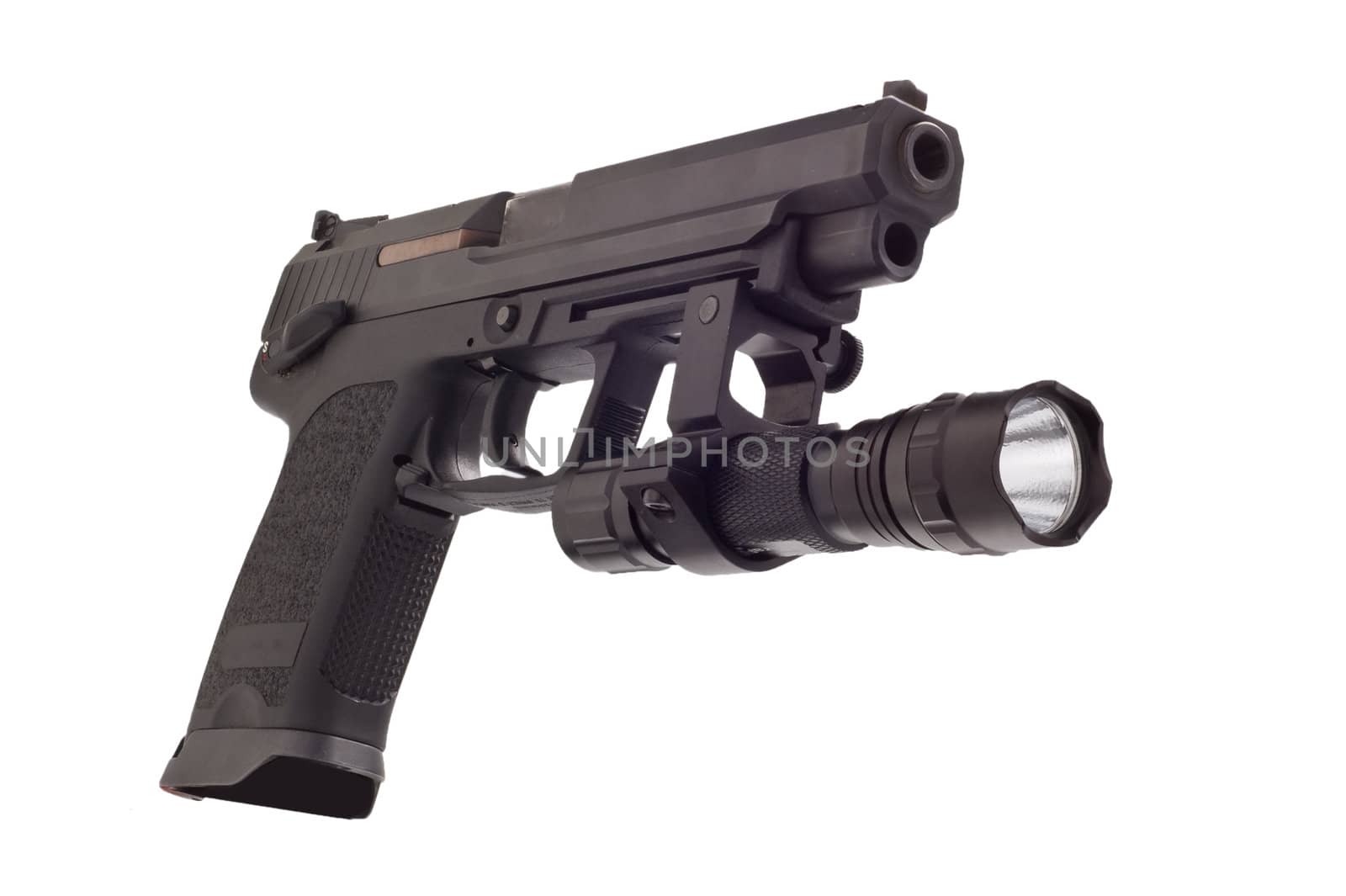 Looking down the barrel of a large 9mm automatic pistol with flashlight