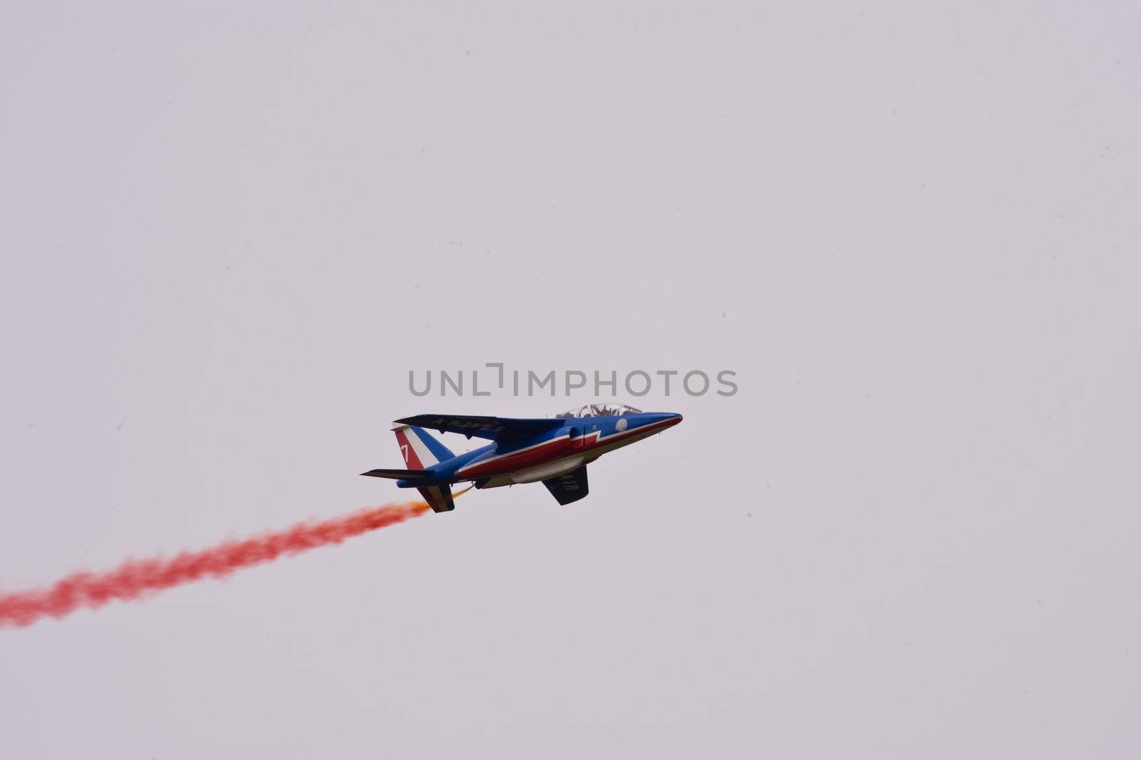 CERNY LA FERTÉ ALAIS, FRANCE - JUNE 12: Patrouille de France performing at Aerial Meeting "The propeller era" in Cerny La Ferté Alais, France on June 12, 2011