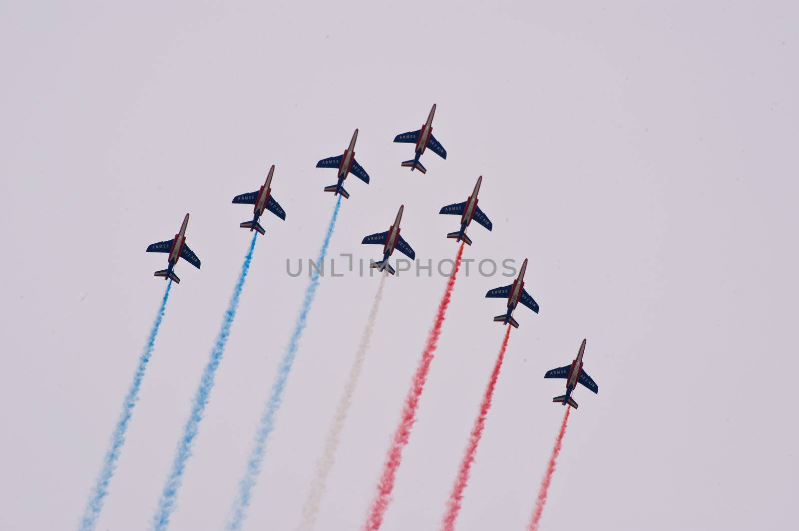 CERNY LA FERTÉ ALAIS, FRANCE - JUNE 12: Patrouille de France performing at Aerial Meeting "The propeller era" in Cerny La Ferté Alais, France on June 12, 2011