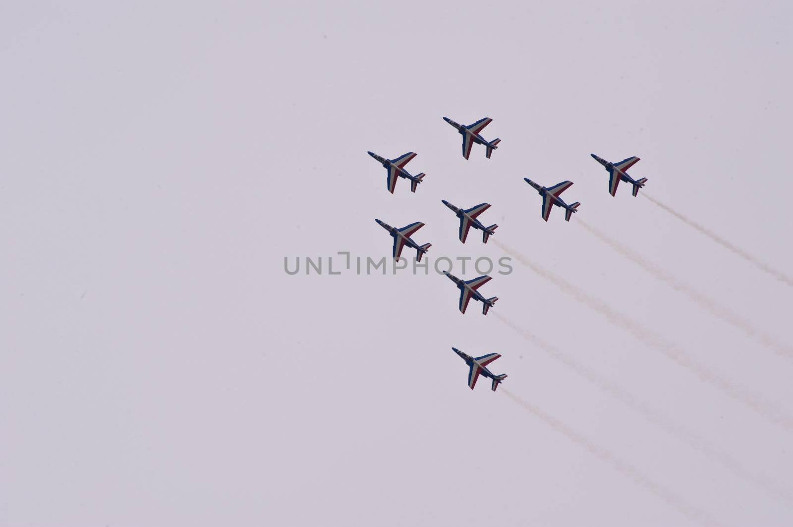 CERNY LA FERTÉ ALAIS, FRANCE - JUNE 12: Patrouille de France performing at Aerial Meeting "The propeller era" in Cerny La Ferté Alais, France on June 12, 2011