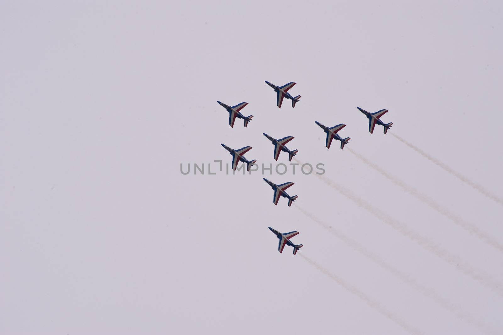 CERNY LA FERTÉ ALAIS, FRANCE - JUNE 12: Patrouille de France performing at Aerial Meeting "The propeller era" in Cerny La Ferté Alais, France on June 12, 2011