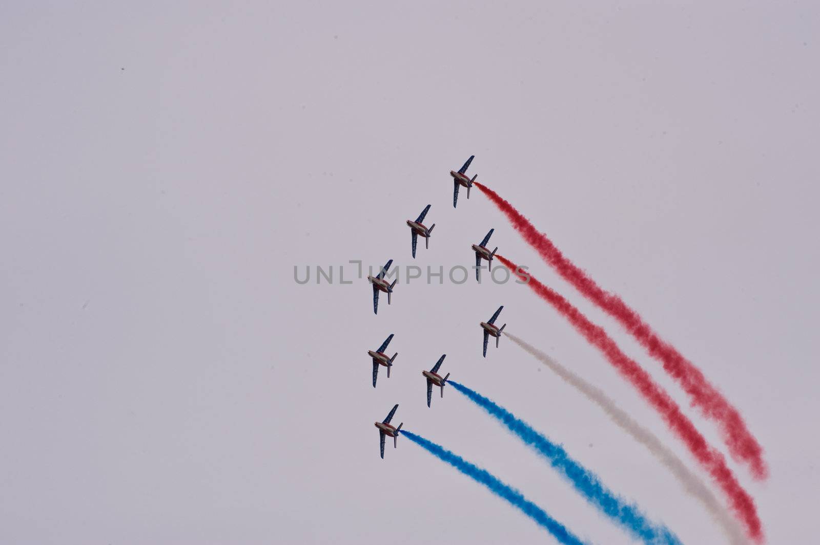 CERNY LA FERTÉ ALAIS, FRANCE - JUNE 12: Patrouille de France performing at Aerial Meeting "The propeller era" in Cerny La Ferté Alais, France on June 12, 2011