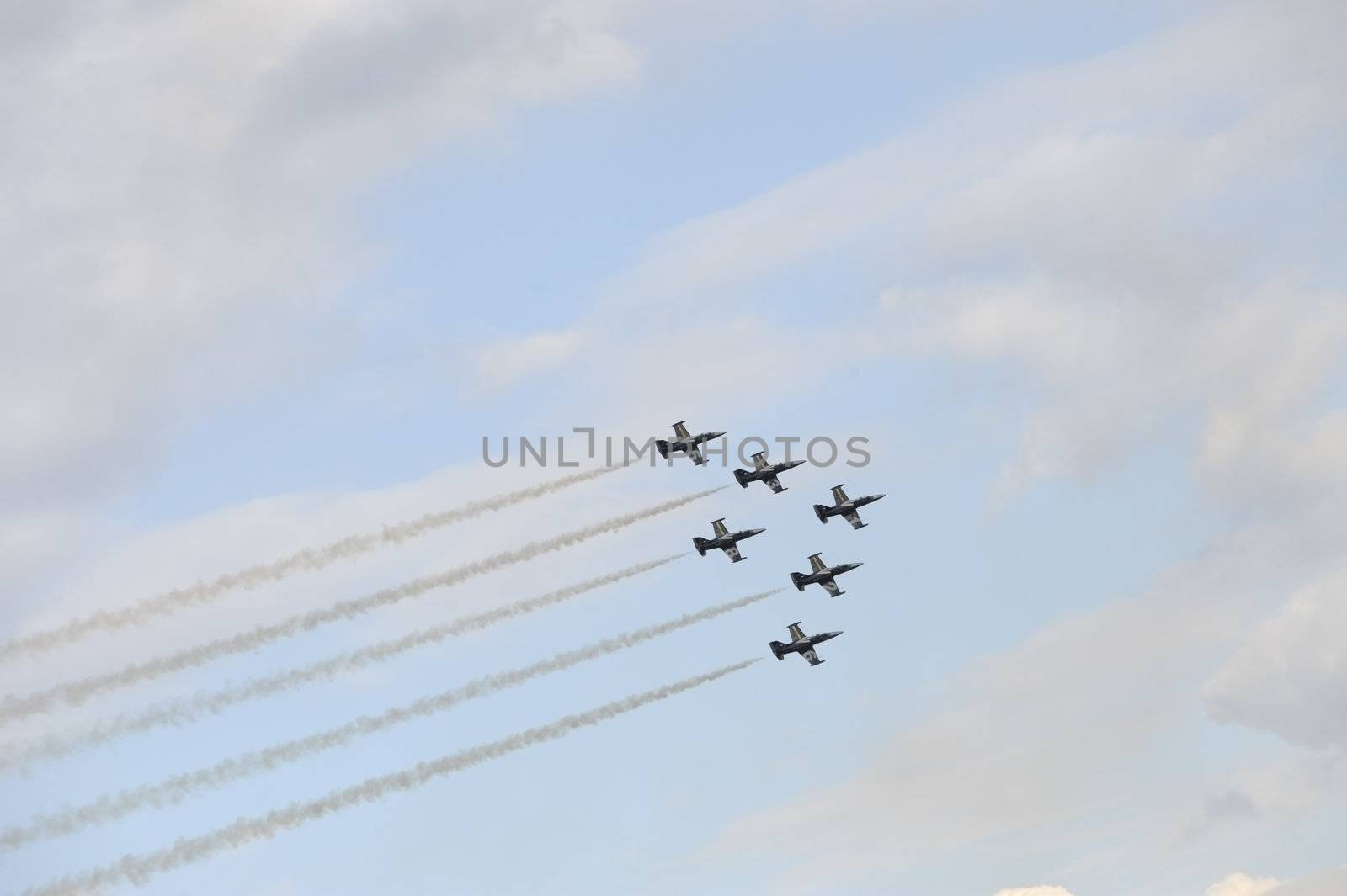 EDE, THE NETHERLANDS - SEPTEMBER 18: Breitling Jet Team at Jan Hilgers Memorial / Airborne drop Arnhem 1944 Memorial in Ede, The Netherlands on September 18, 2010