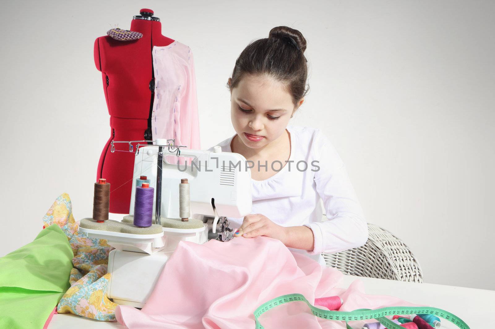 Portrait of little seamstress