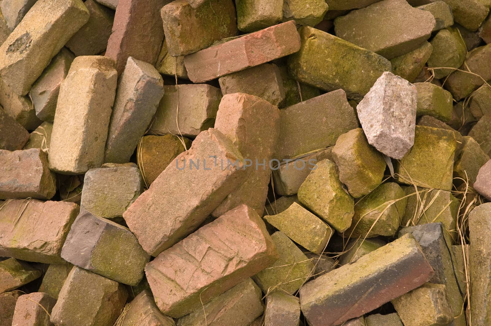 a close up of an old pile of bricks 