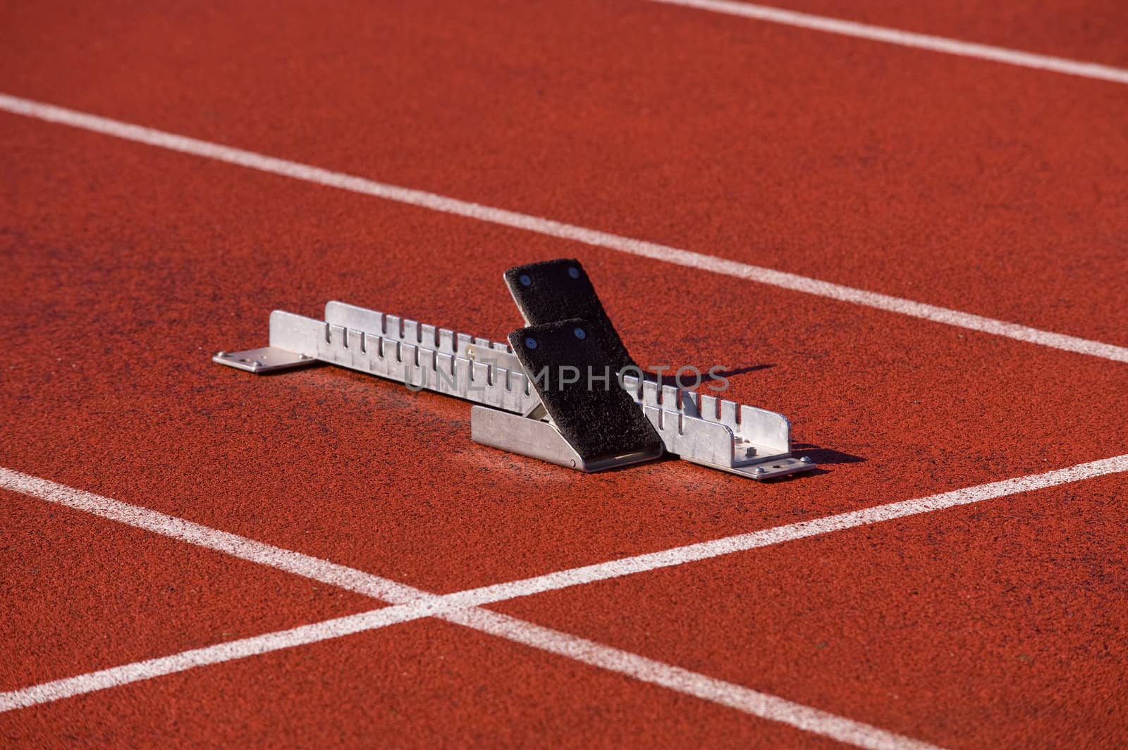 Starting bloks on red running tracks