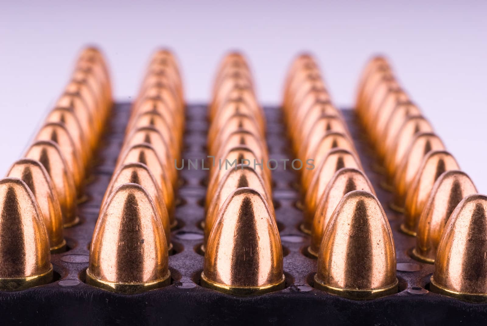 Tray with 9 mm pistol cartridges