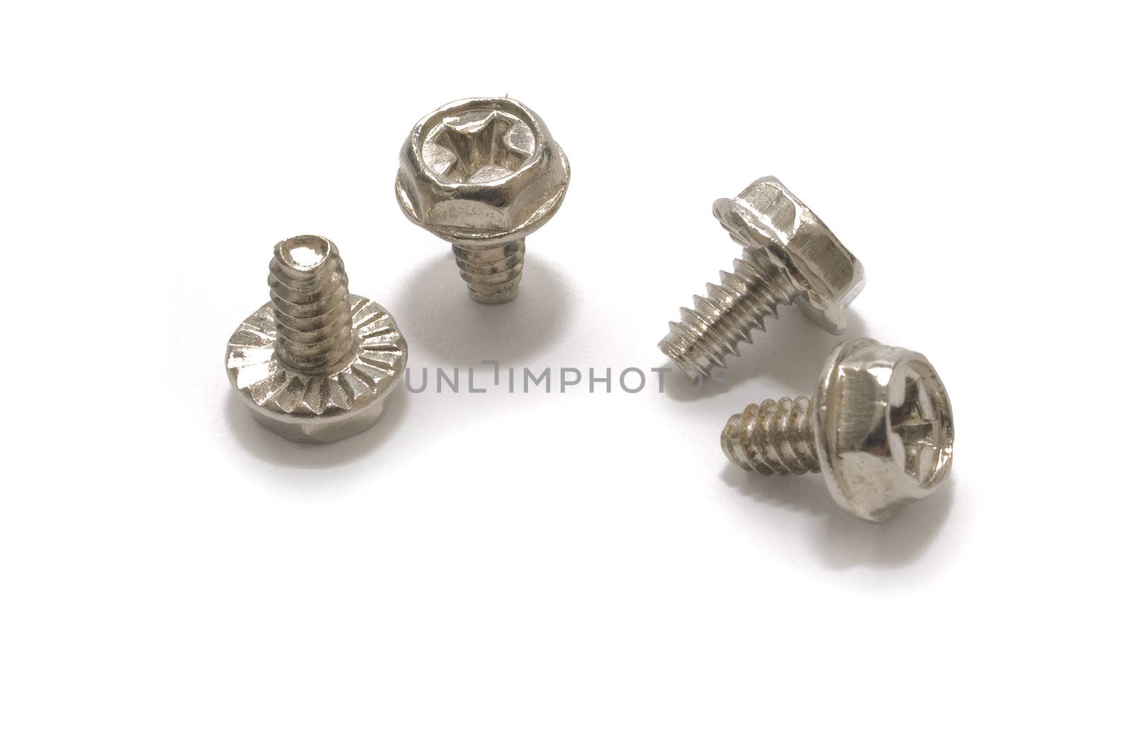 Four screws, hexagonal philips-head on white background