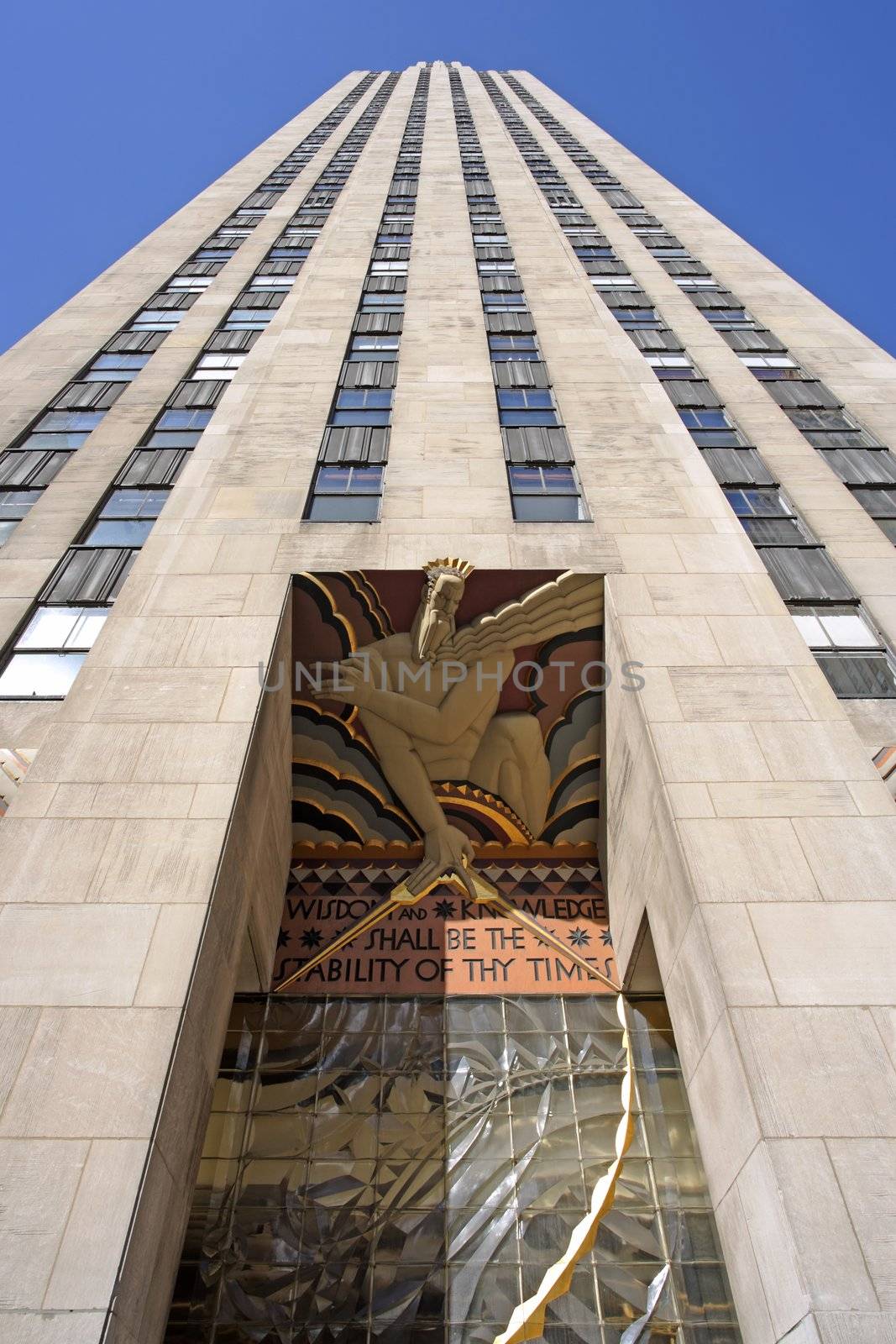 New York City, New York, USA - October 6, 2010: Rockefeller Center skyscraper as seen from street level in Rockefeller Plaza.