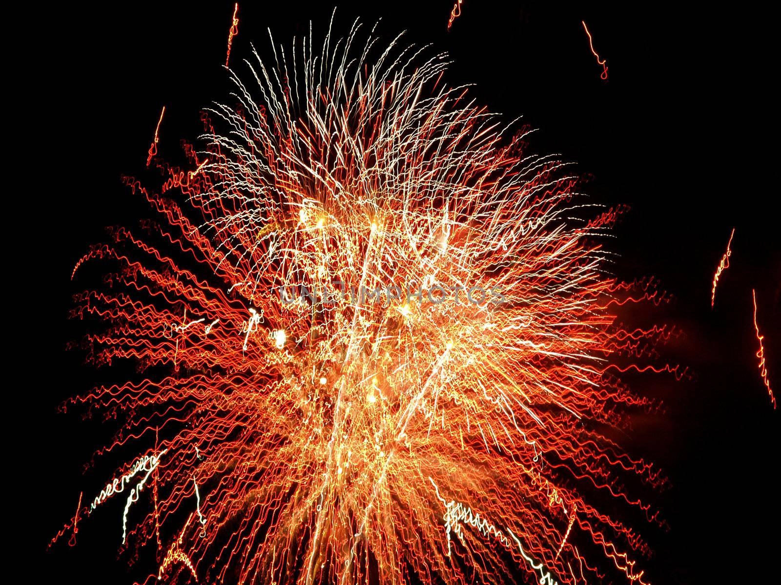 Long Exposure of Multicolored Fireworks Against a Black Sky