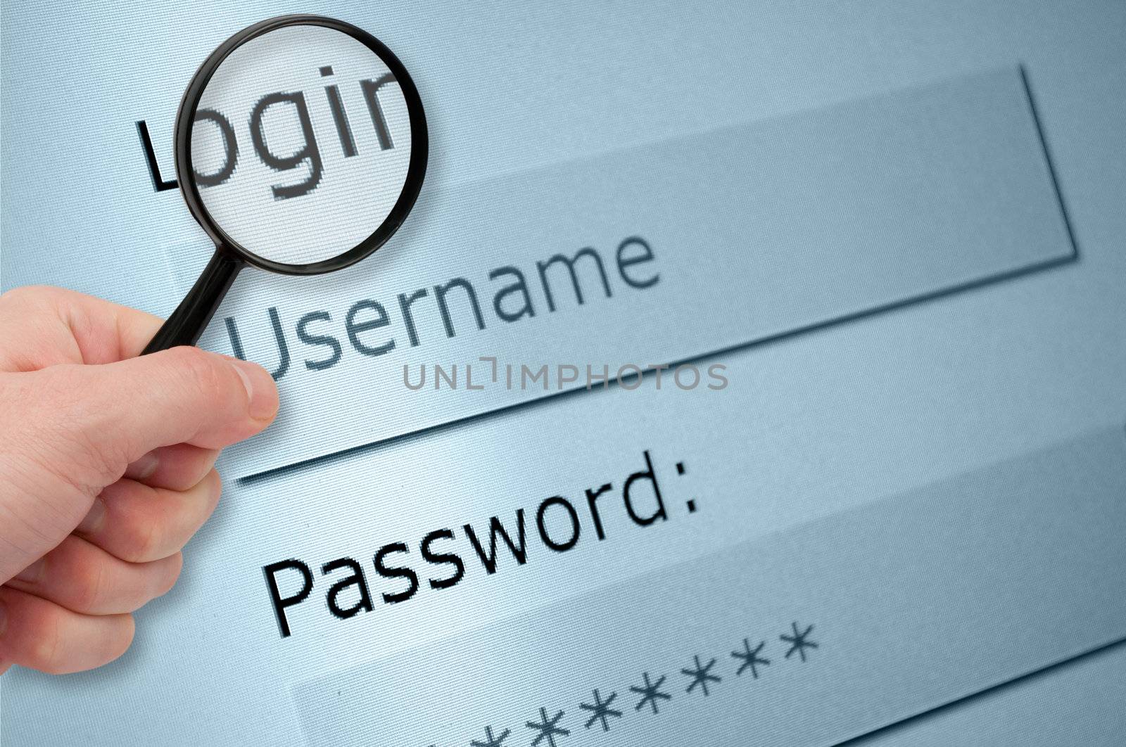 Man's Hand Holding Magnifying Glass over Browser Window With Username and Password Fields