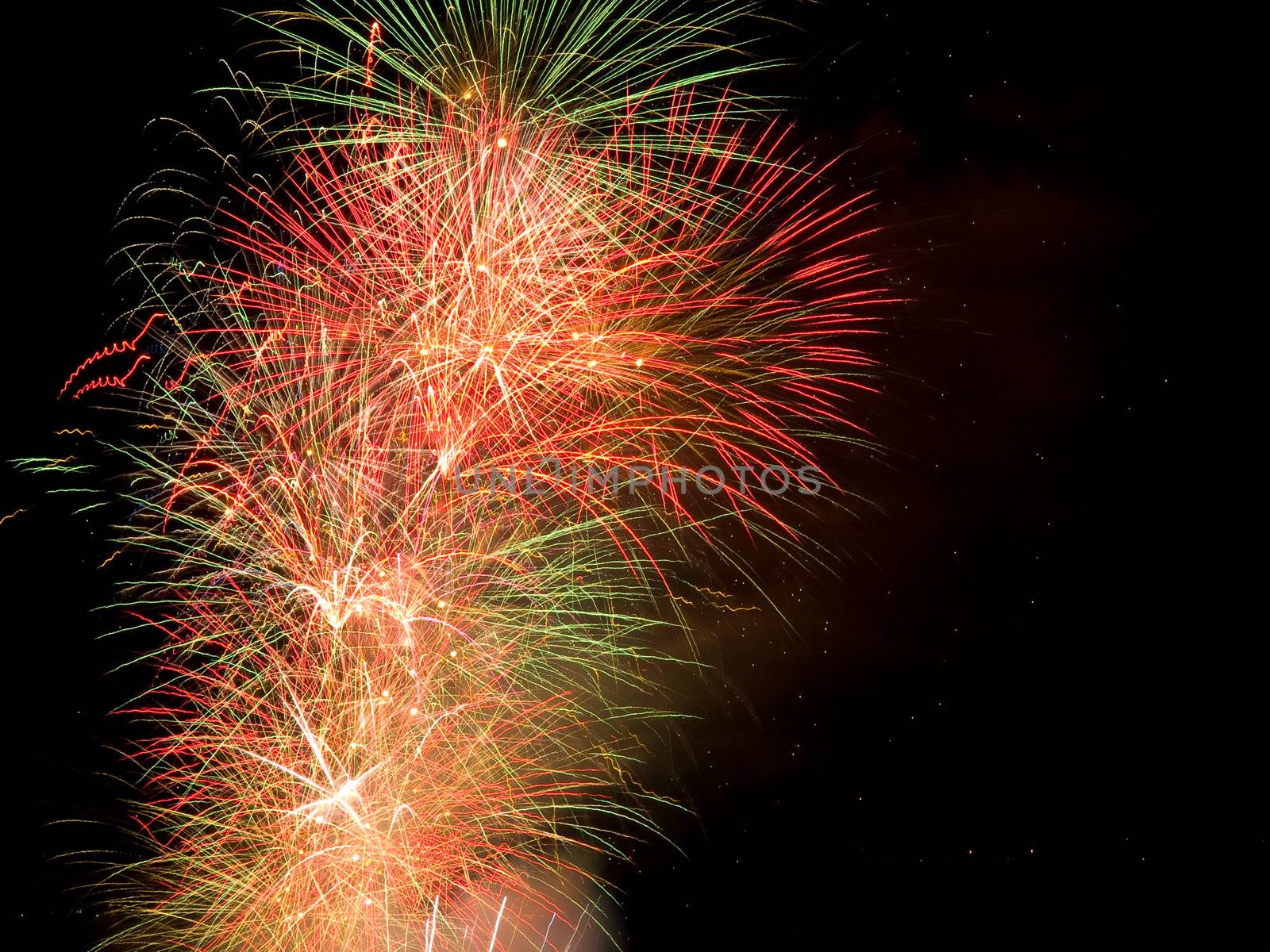 Long Exposure of Multicolored Fireworks Against a Black Sky