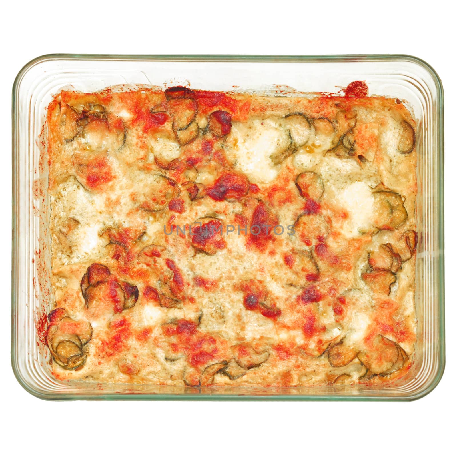 Detail of courgettes (zucchini) pizza - isolated over white background