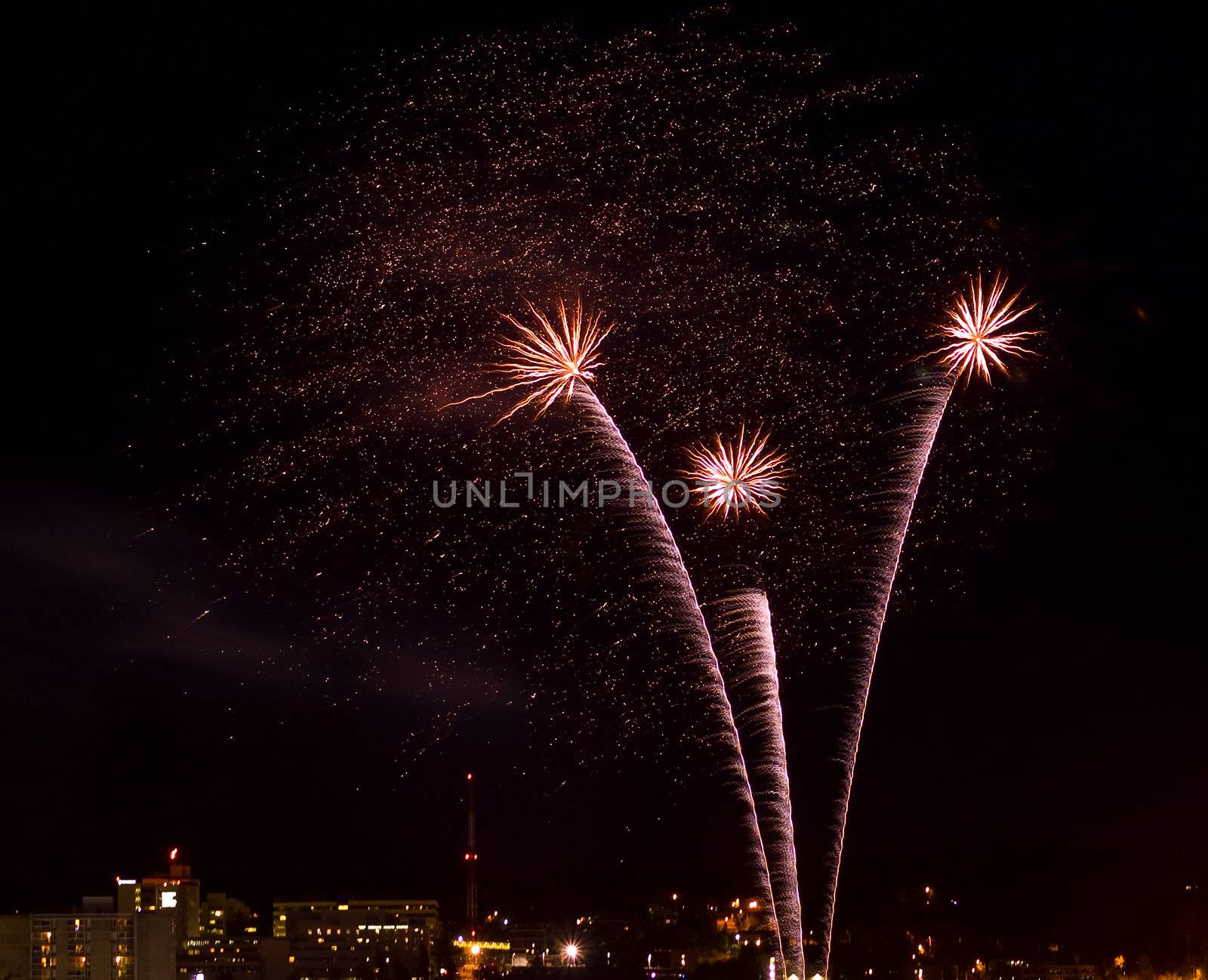 Fireworks Against the Night Sky of a Cityscape