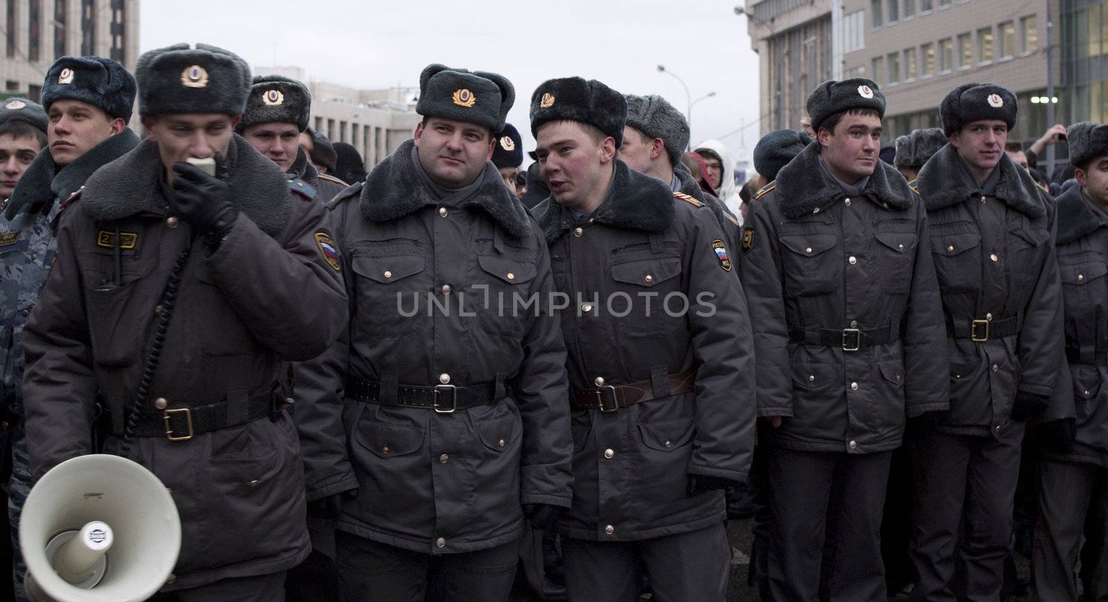 Russia, Moscow - DECEMBER 24: 
Policemen with megaphone at work.
The biggest protest in Russia for the last 20 years. 