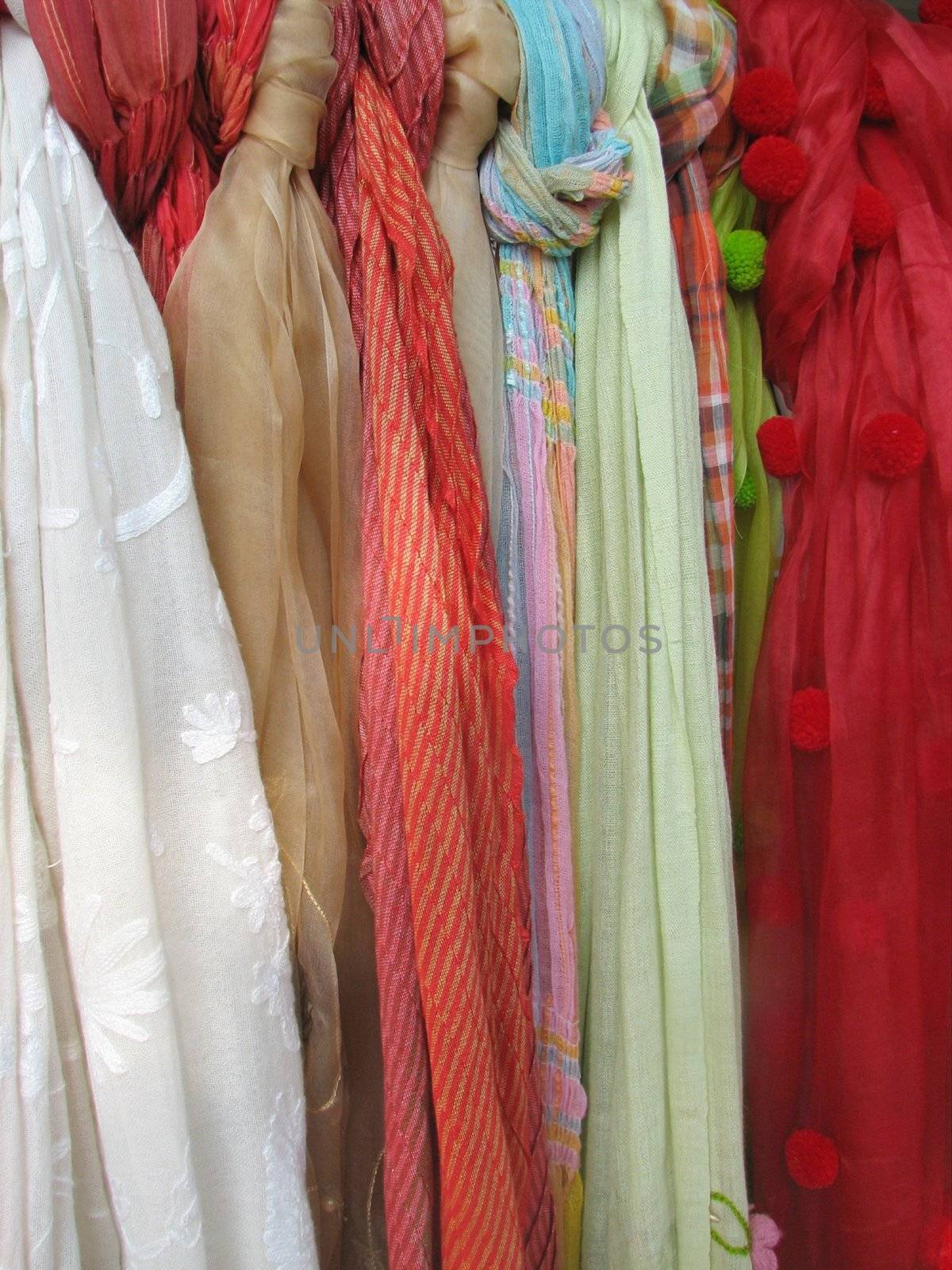 summer scarfs on display, usable as fabric or textile background