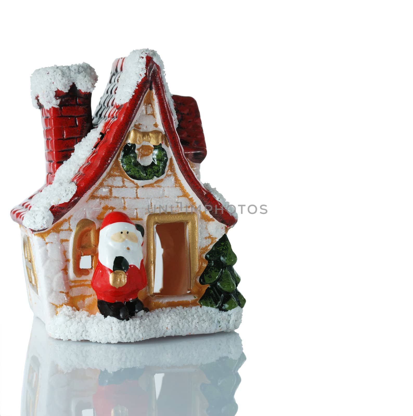 The house with Santa Claus on an input. A New Year's toy