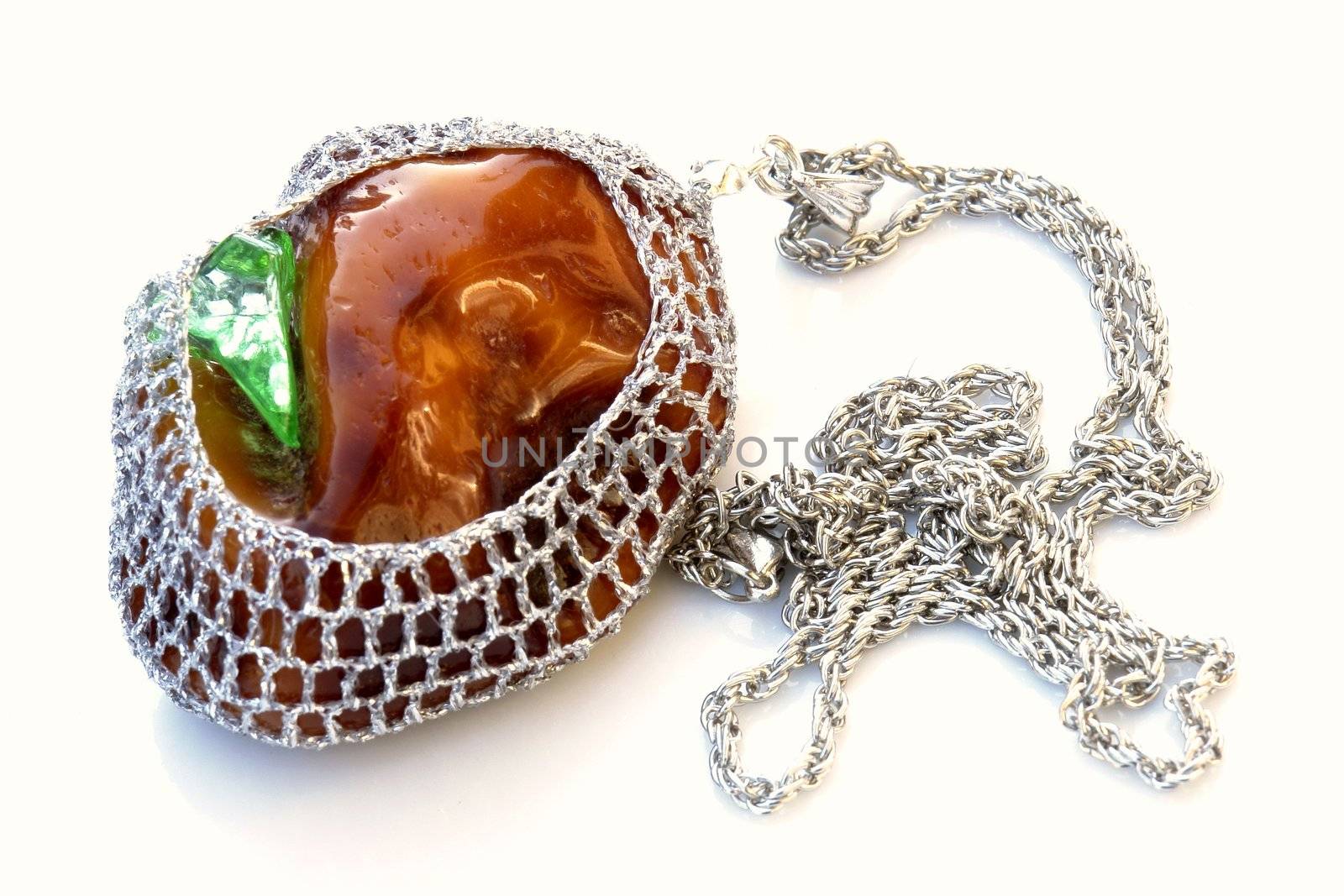 amber jewellery on the white background 
