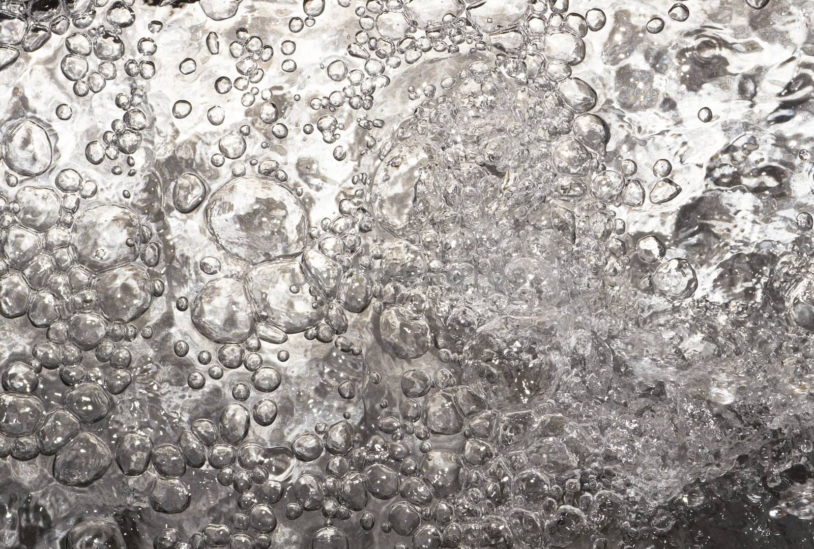 Water bubbles created by directed air stream