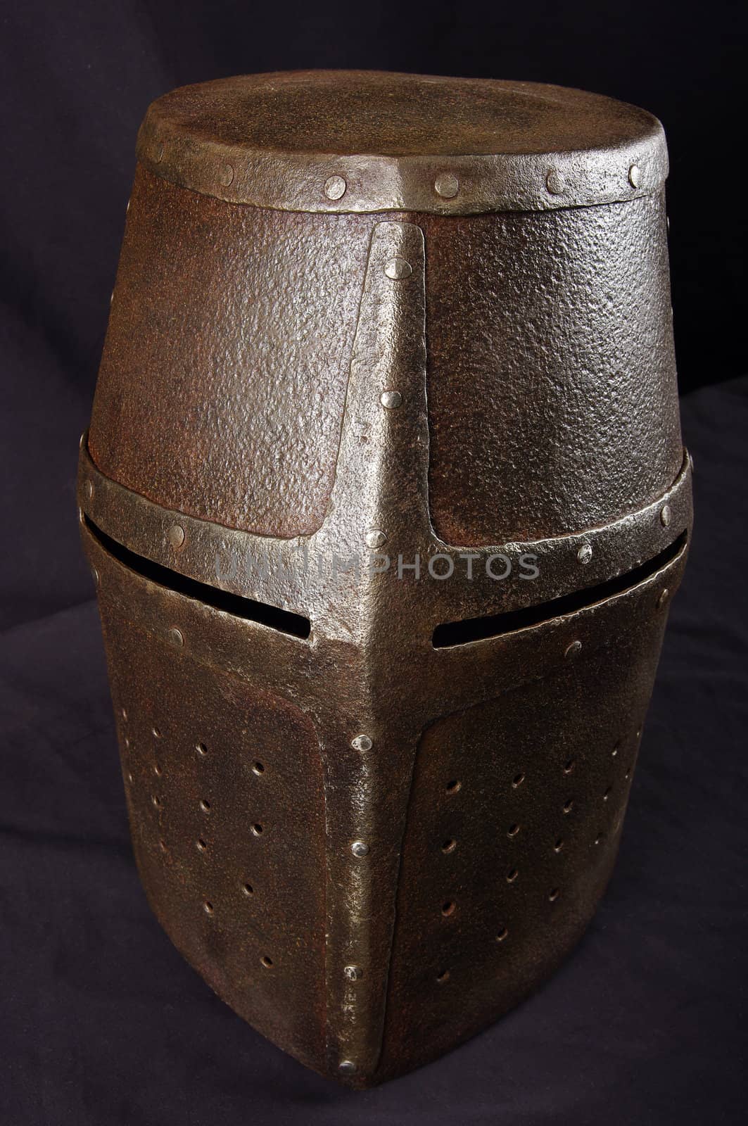 Iron helmet of the medieval knight. Very heavy headdress