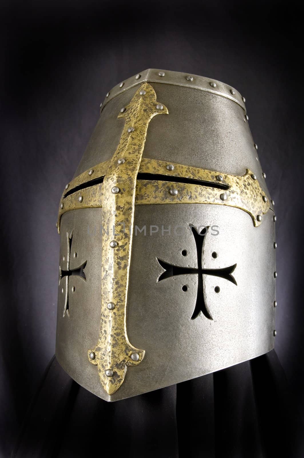 Iron helmet of the medieval knight. Very heavy headdress