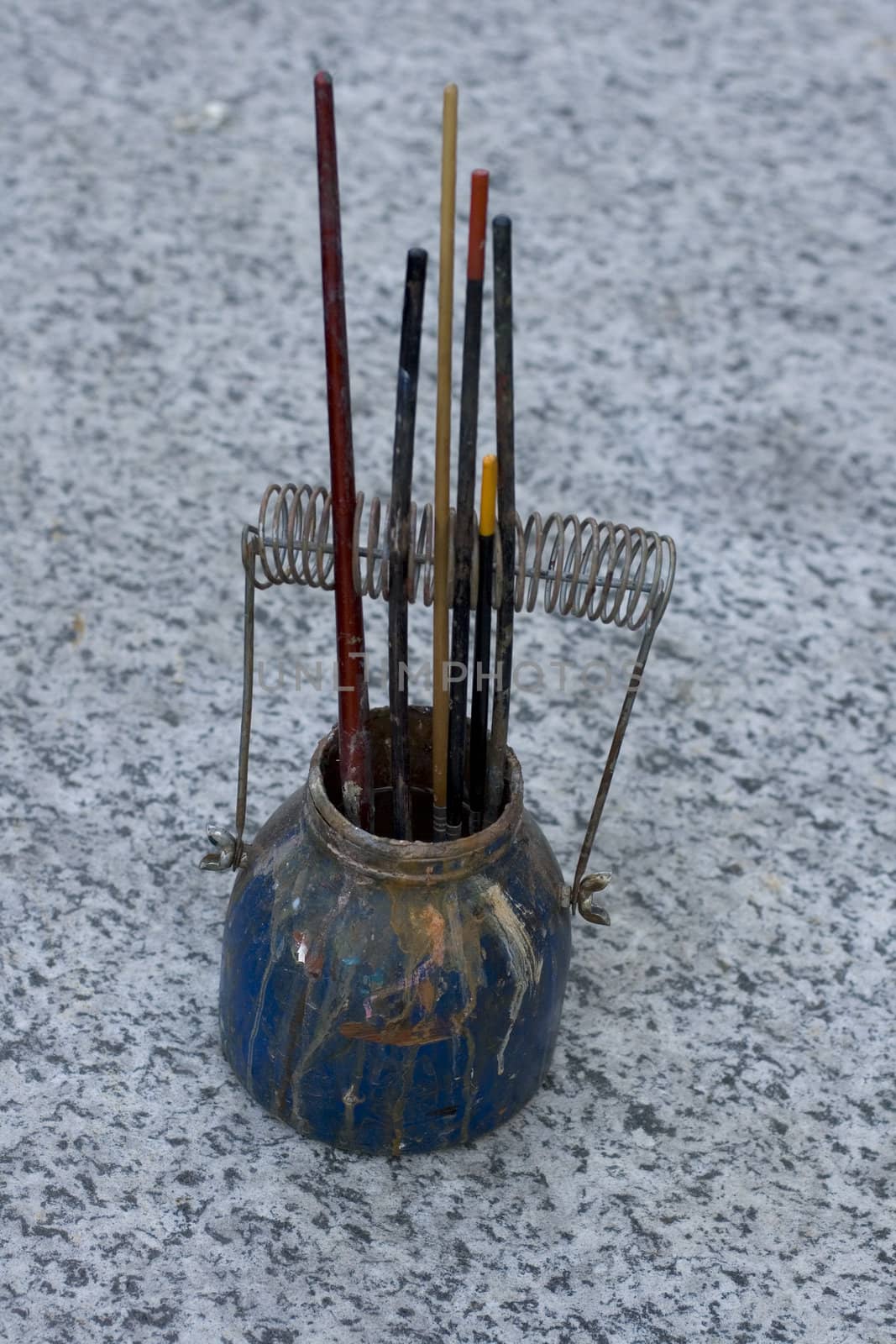 Photo of paintbrushes inside a cup