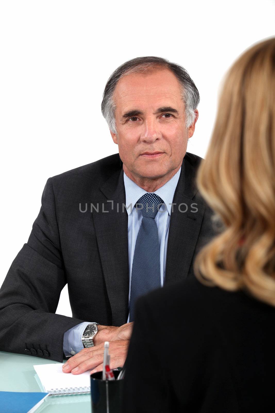 Woman having job interview by phovoir