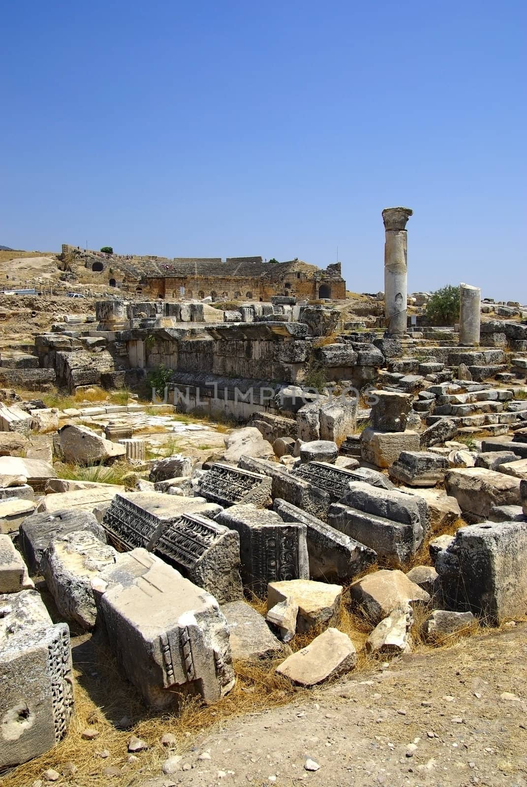 Ruins of Ancient city Hierapolis. Amphitheater and temple. Pamukkale, Turkey.