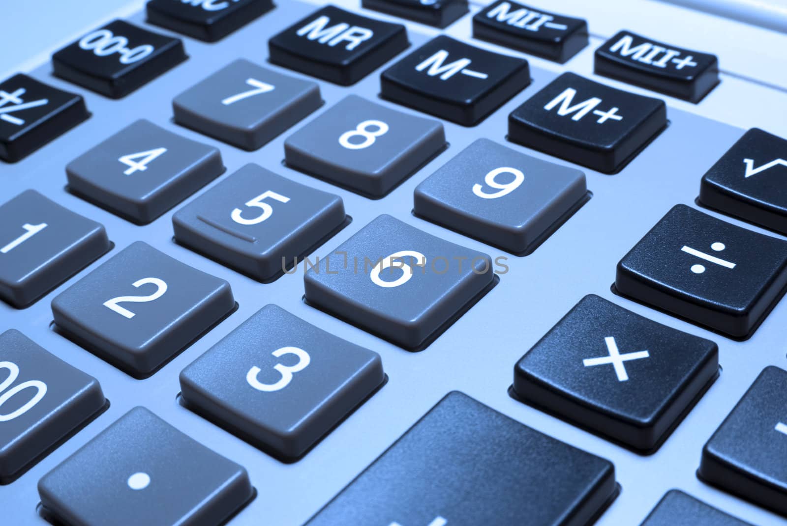 Calculator closeup with cold photo filter. by borodaev