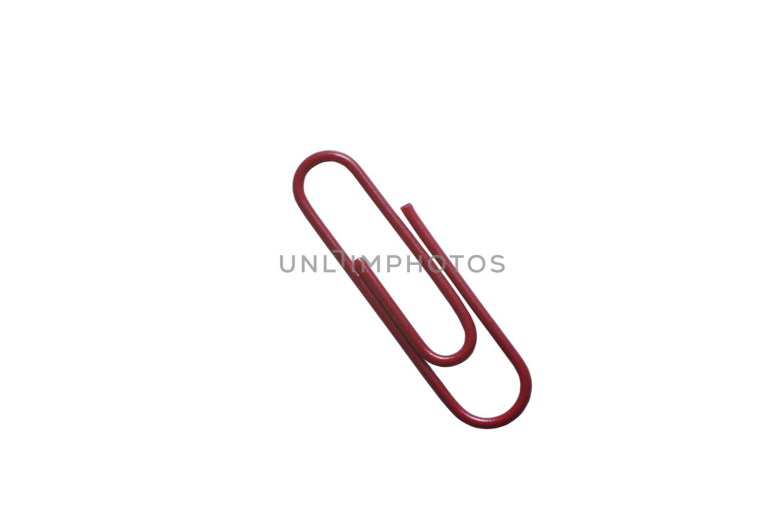 Red paper-clip isolated on white background with clipping path. by borodaev