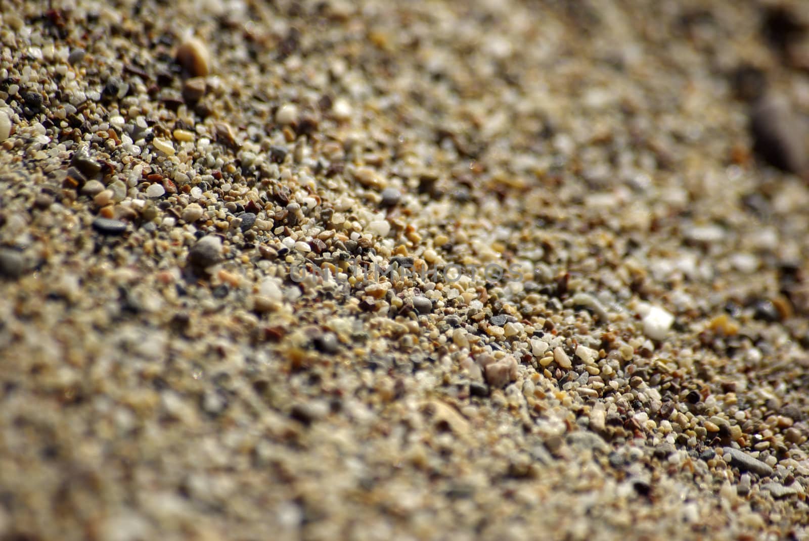 Close-up of sand at the beach. Mediterranean Sea, Side, Turkey. by borodaev