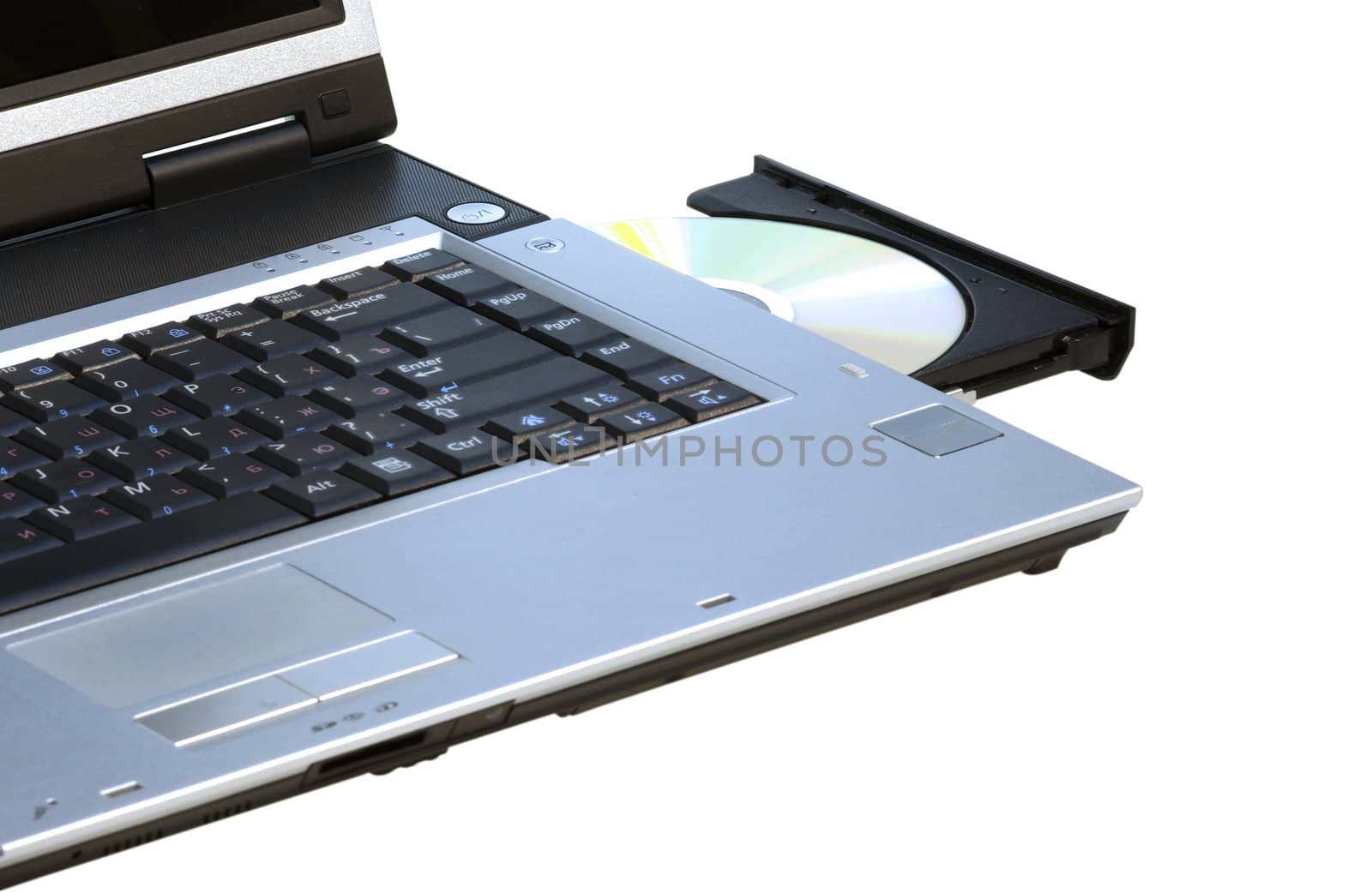 Laptop with opened DVD rewriter and a disc in it. Isolatet with  by borodaev