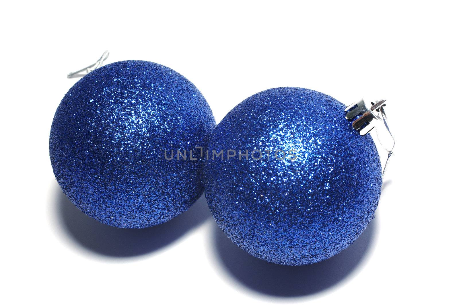 Blue christmass balls isolated on white background. by borodaev