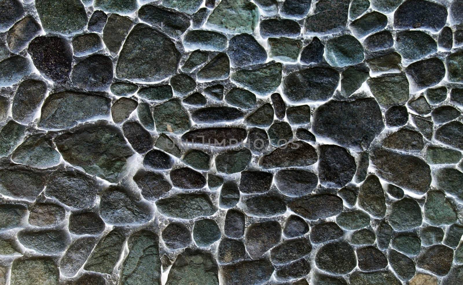 Abstract ghostly wall made of stone. Cold color textured background.