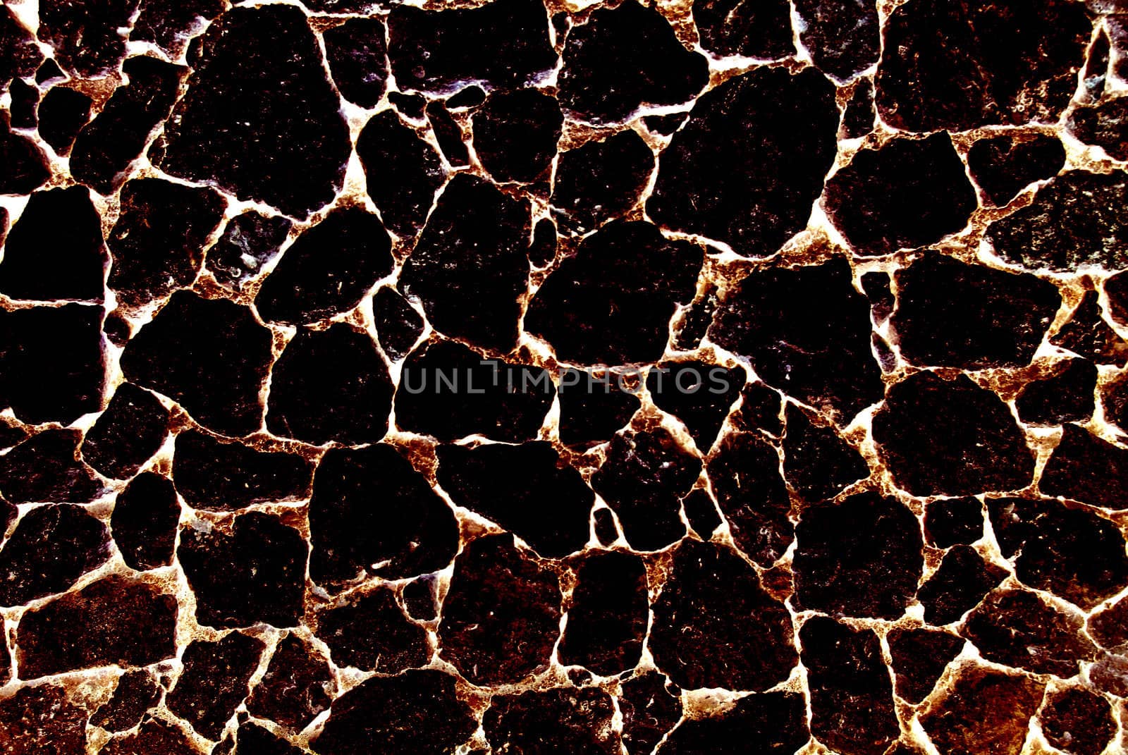 Burnt volcanic stone abstract textured background. by borodaev