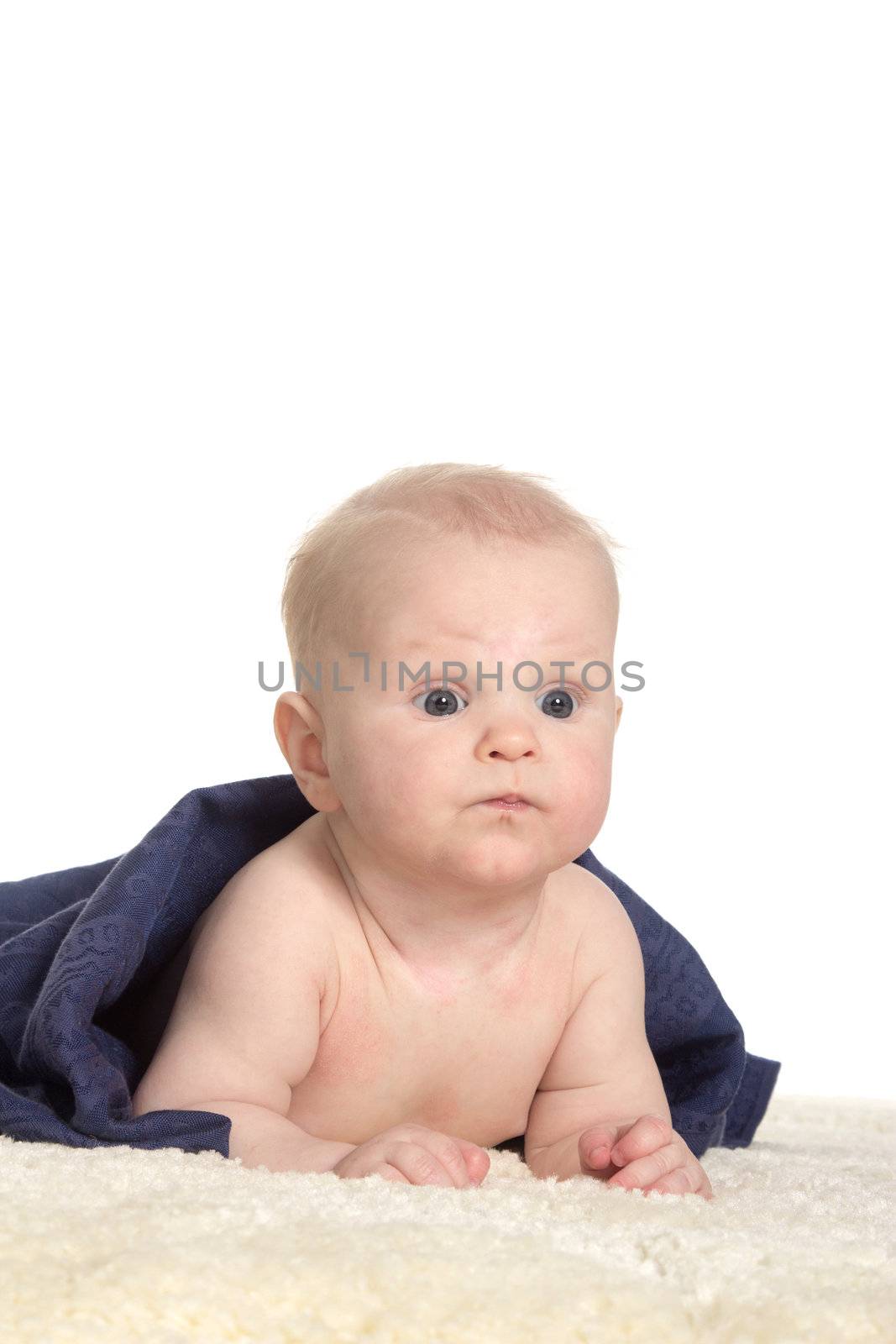 Adorable happy baby in colorful towel on white background isolated